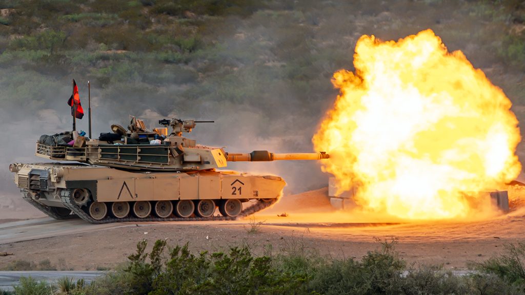 A U.S. Army M1A2 SEPv2 Abrams assigned to Alpha Company, 1st Battalion, 67th Armor Regiment, 3rd Brigade Combat Team, 1st Armored Division fires at a target before quickly disengaging into a defilade to load a new round at McGregor Range, New Mexico, Sept. 29, 2023. Alpha Co. executed Gunnery Table VI, which evaluates crews on engaging stationary and moving targets while utilizing all weapons systems in offensive and defensive positions, ensuring our crews are trained and ready for any mission. (U.S. Army photo by Spc. David Poleski)